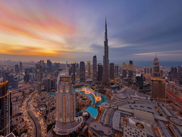 Dubai skyline at sunset with skyscrapers